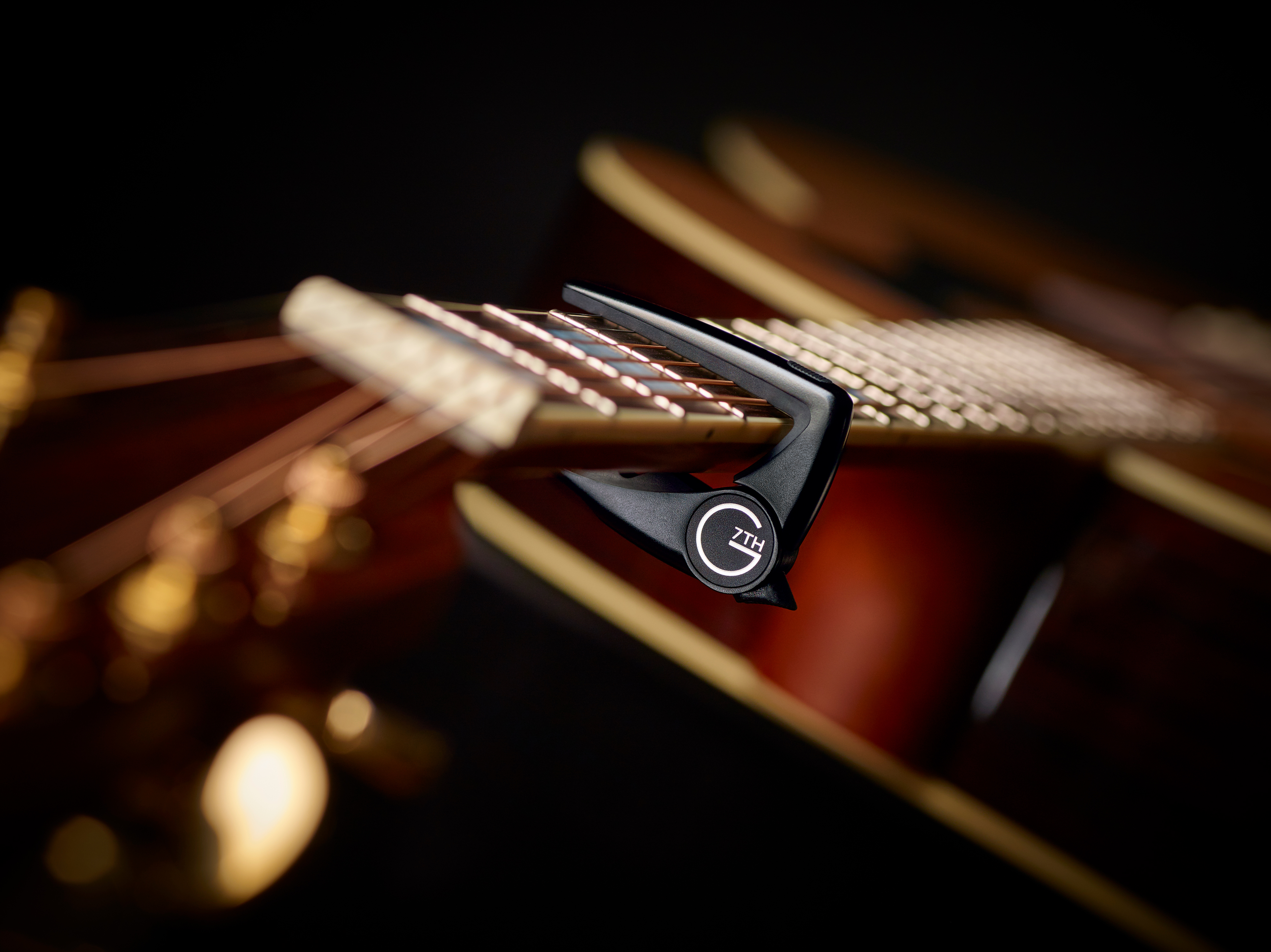 Performance 2 (Steel String Satin Black) on guitar