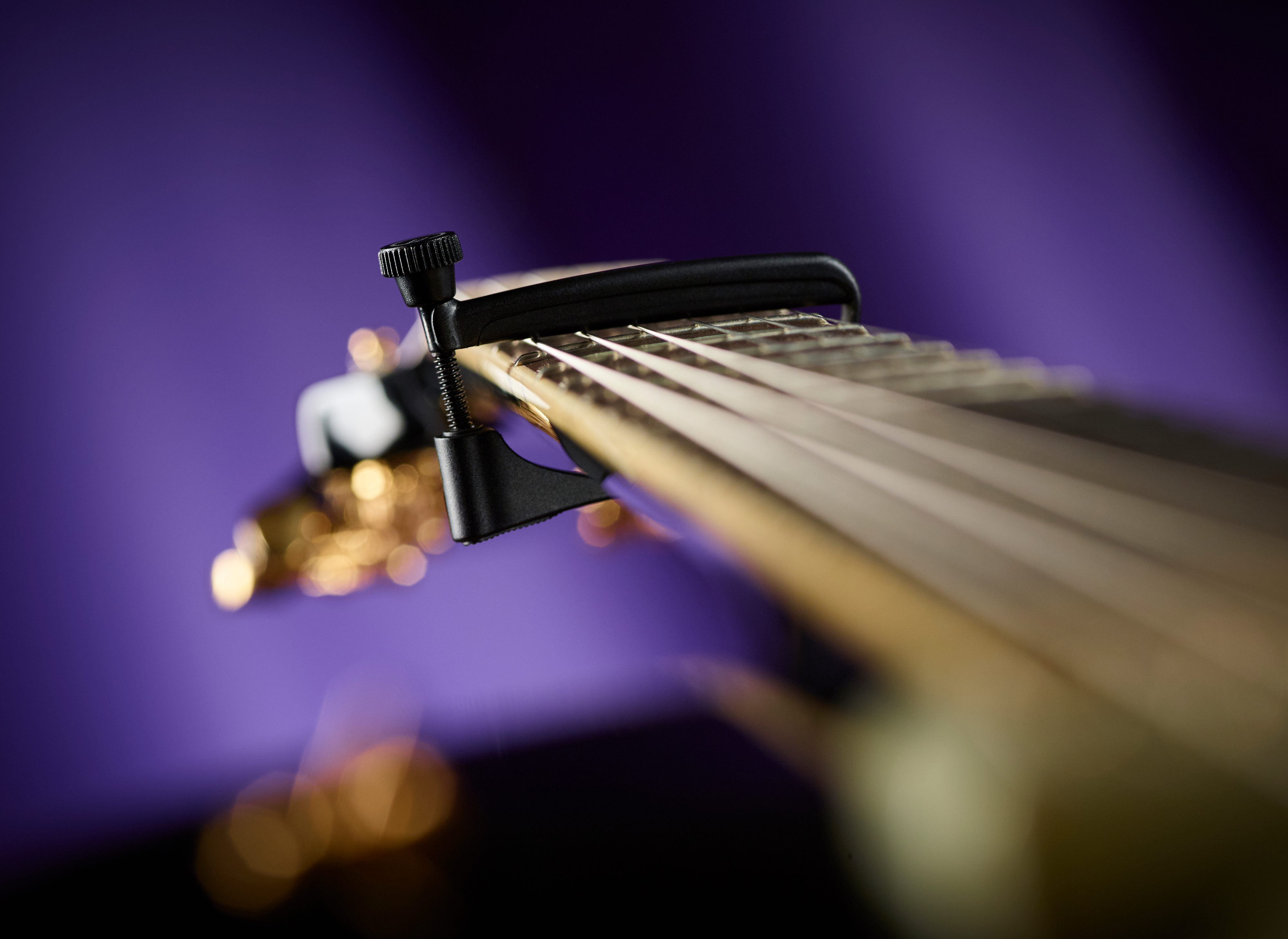 UltraLight (Steel String Black) on guitar 
