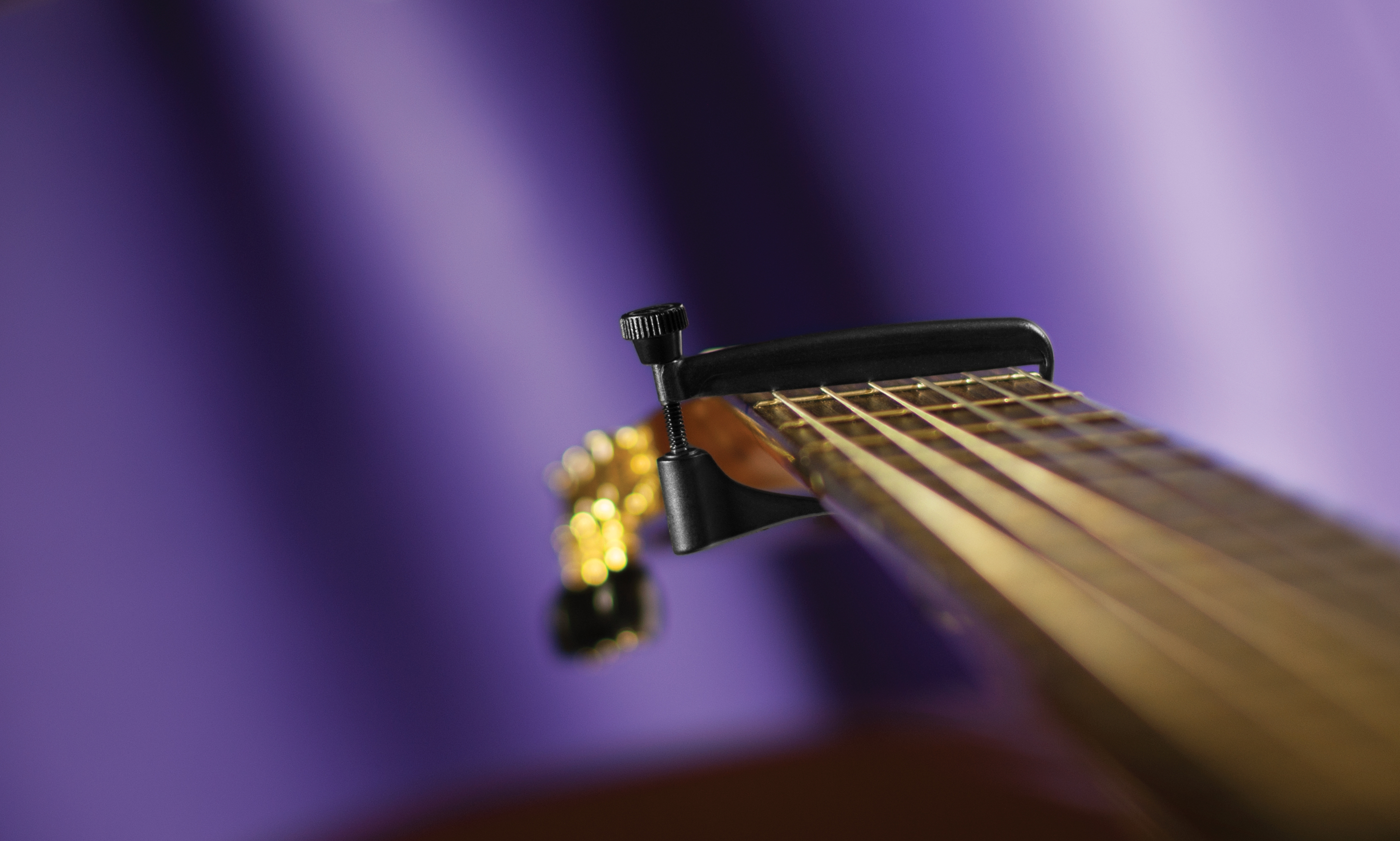 UltraLight (Classical Black) on guitar