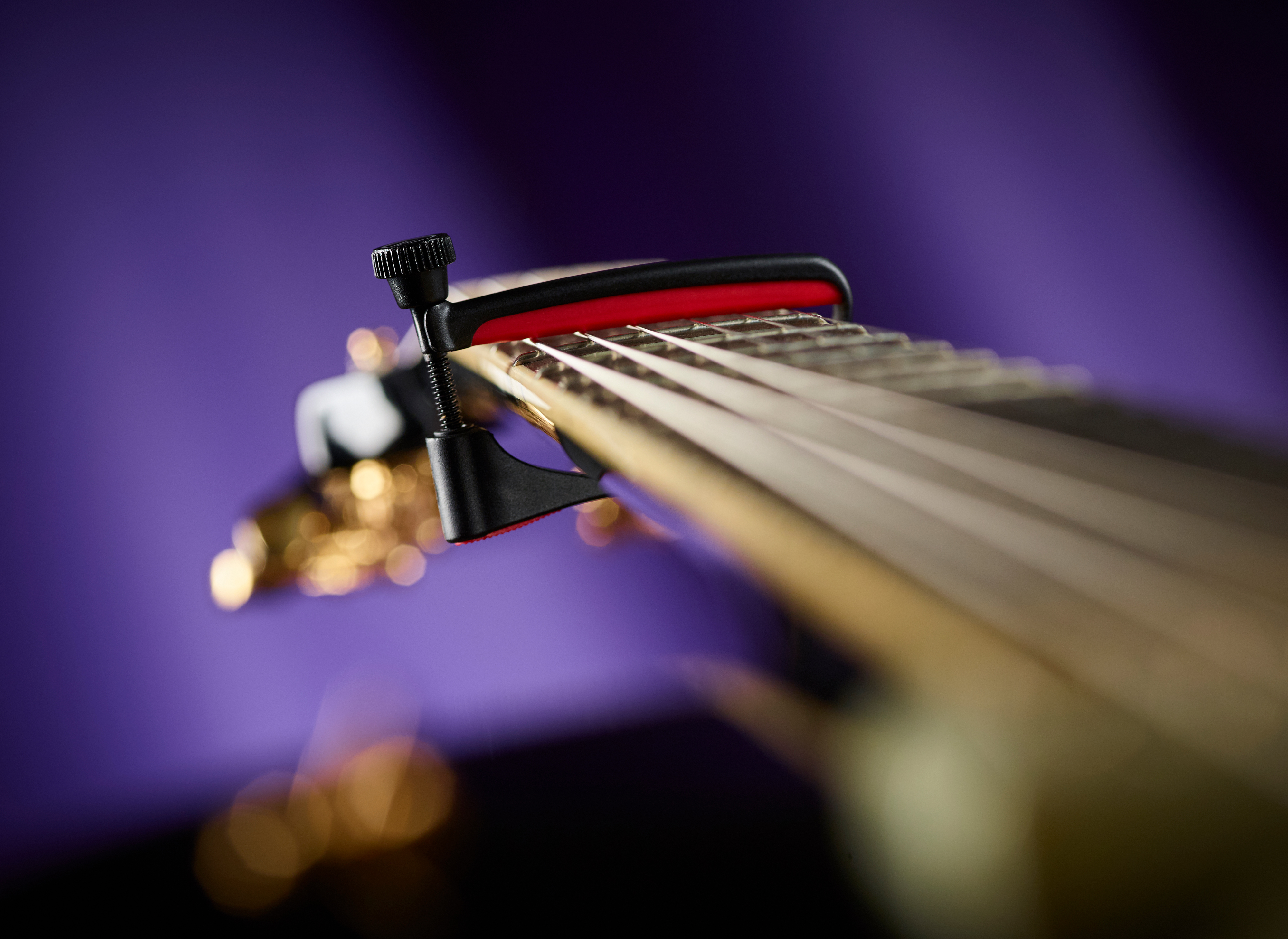 UltraLight (Steel String Red) on guitar 